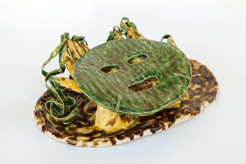 Cathy Lu, American Dream Pillow (Beauty Mask), 2020, porcelain with glaze, 11 × 14 × 17 in., Collection of Gorretti Lo Lui